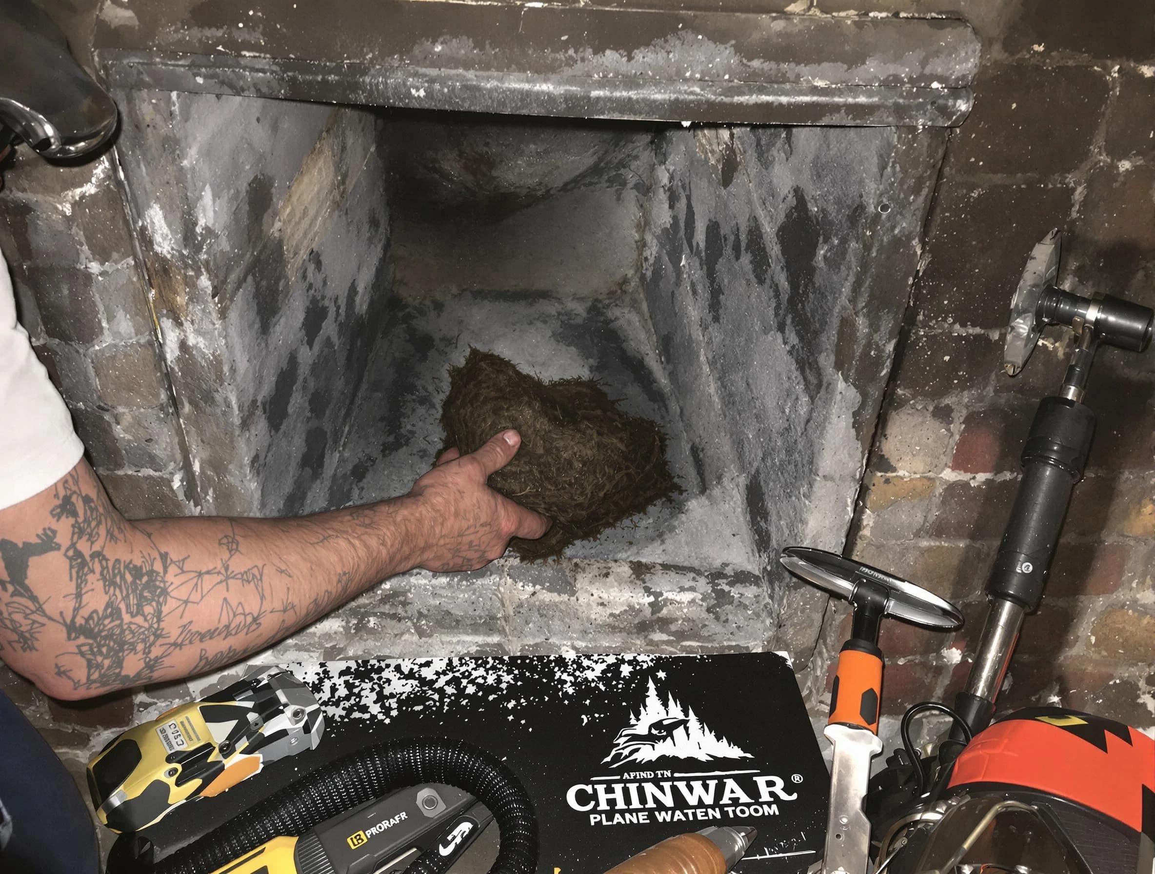 Riverton Chimney Sweep safely removing debris and screening chimney in Riverton, UT